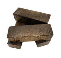 Sourced from the black palm tree, this knife making handle material features a distinctive pattern with a rich, dark base interspersed with lighter streaks and flecks, creating an eye-catching, speckled appearance.