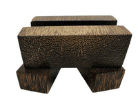 Sourced from the black palm tree, this knife making handle material features a distinctive pattern with a rich, dark base interspersed with lighter streaks and flecks, creating an eye-catching, speckled appearance.