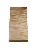 Yellow and brown waves  in a stabilized wood block for custom knife making. Knife handles stabilized wood.