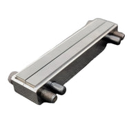 Two pieces of metal with a large screw on either end. A file guide are used mainly for grinding the ricasso and hidden tang shoulders for custom knife making.