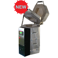 
              Vertical Kiln that is silver, open lid shows now to load knife blades. Heat treat oven for custom knife making. 
            