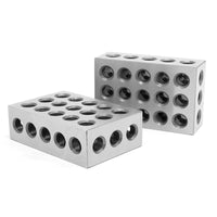 
              Two rectangular blocks with 18 holes on front and back and along sides. A 1-2-3 block is a layout tool that can be used for both metal and woodworking.
            