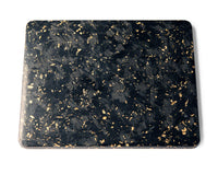 
              One black and gold sheet on the textured side. One side of Carbon Fiber Shred has a textured feel and opposite side is a smooth, glossy surface. 
            