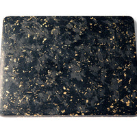 One black and gold sheet on the textured side. One side of Carbon Fiber Shred has a textured feel and opposite side is a smooth, glossy surface. 