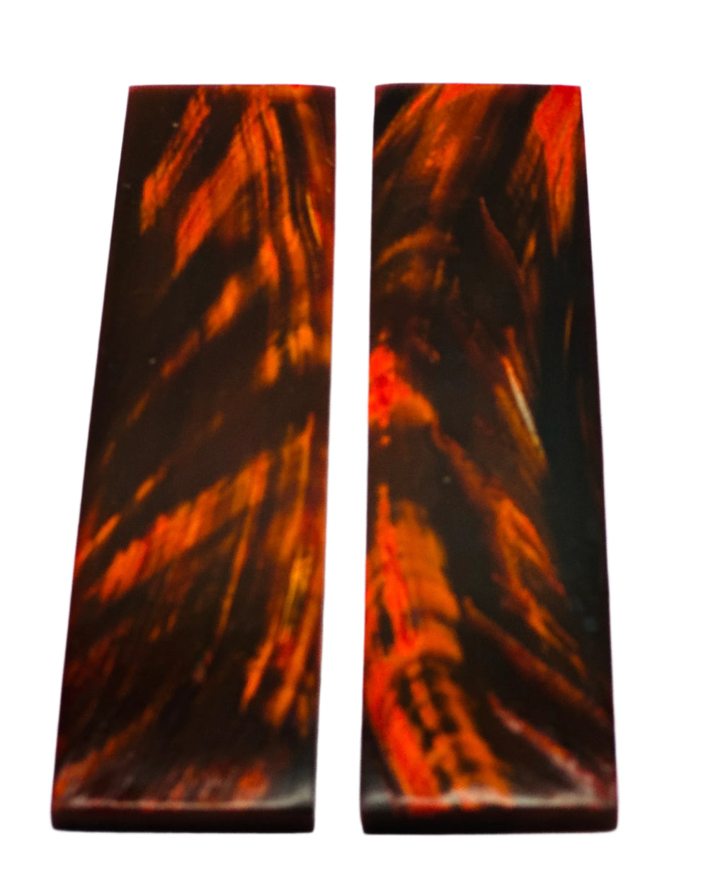 Buffalo Horn Scales - Various Colours offer a unique blend of durability and aesthetics. Shows two red scales. 