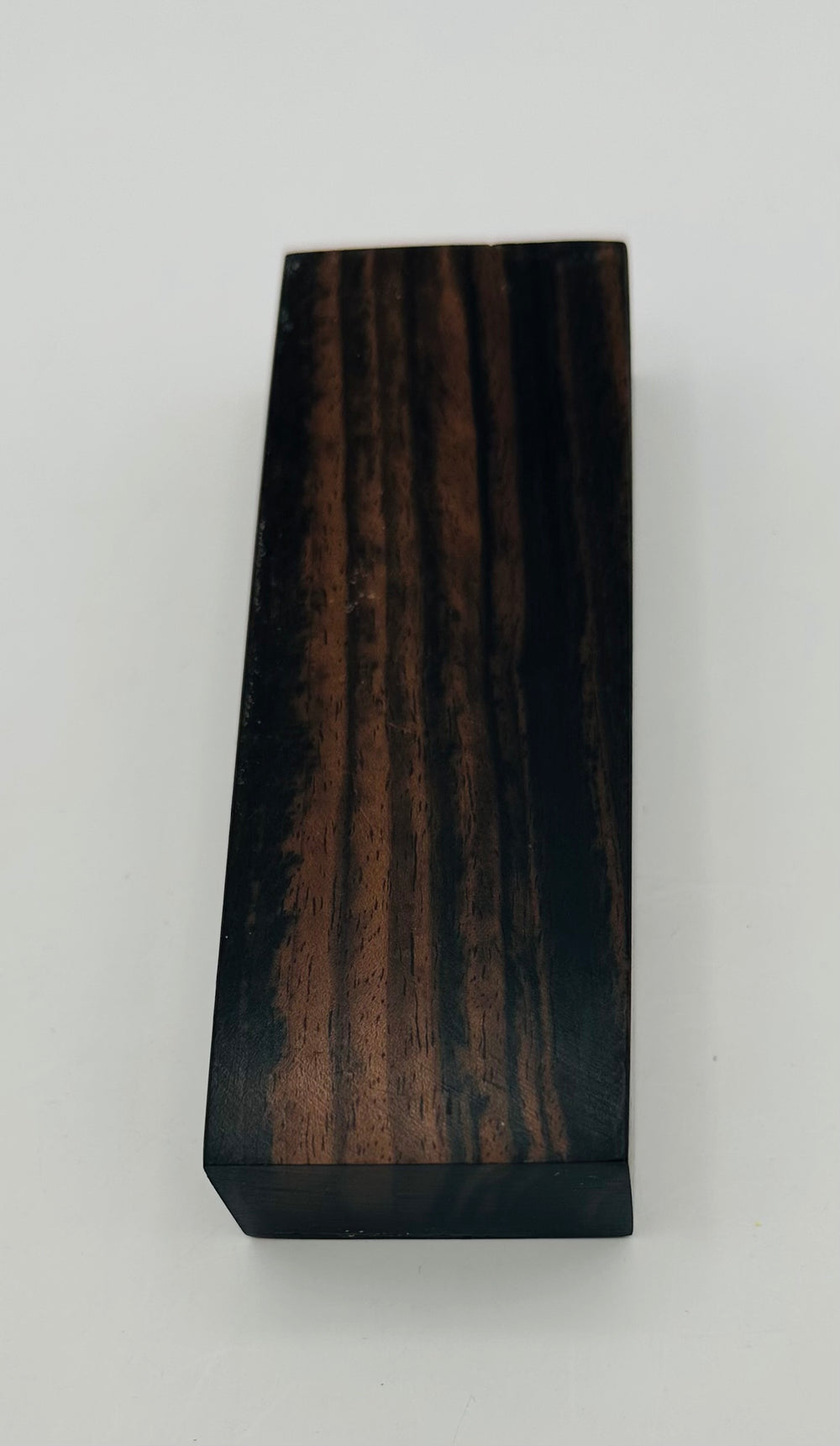 Stabilized Ceylon Ebony, also known as Indian Ebony is an exotic wood most ordinarily native to southern India and Sri Lanka. It makes beautiful knife handles. Shown is a  block. 