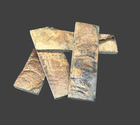 
              Buffalo Horn with Bark knife handle scales feature the raw, textured beauty of the bark, adding a rustic charm with lasting durability. Four scales with brown, black and yellow streaks. 
            