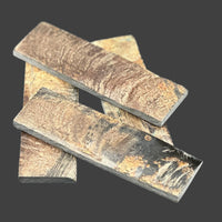 Buffalo Horn with Bark knife handle scales feature the raw, textured beauty of the bark, adding a rustic charm with lasting durability. Four scales with brown, black and yellow streaks. 