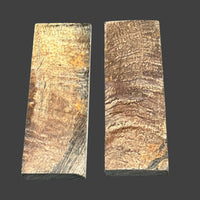 Buffalo Horn with Bark knife handle scales feature the raw, textured beauty of the bark, adding a rustic charm with lasting durability. Two scales with brown, black and yellow streaks. 