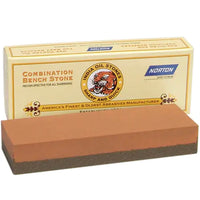 Box with tiger with a orange and black rectangular stone in front. Each Combination Stone has fine and coarse grit surfaces (one grit to each side), providing complete, sharpening.