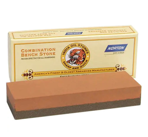 Box with tiger with a orange and black rectangular stone in front. Each Combination Stone has fine and coarse grit surfaces (one grit to each side), providing complete, sharpening.