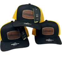 
              Three yellow and black trucker hats with Knifemaker.ca.
            