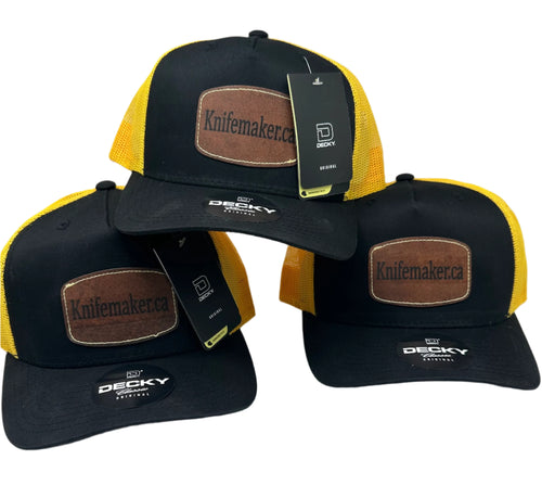 Three yellow and black trucker hats with Knifemaker.ca.