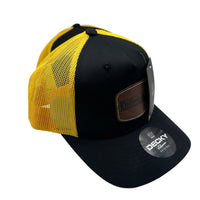 Side view of one yellow and black trucker hats with Knifemaker.ca.