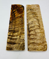 
              Natural Rams Horn Scale Sets are crafted from authentic ram horn with a unique blend of hues. Shows two scales of beige and brown lines. 
            