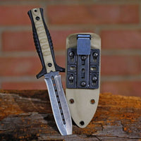 
              Ultiplate attached to a knife sheath beside a dagger. 
            