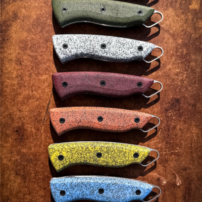 Grip-Tec™ is a revolutionary rubber and resin composite  ideal for hunting knives, filet knives, kitchen knives, and your favorite EDC knife. It comes in many vibrant colours. Shown are a variety of colours on knife handles. 