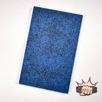 Grip-Tec™ is a revolutionary rubber and resin composite  ideal for hunting knives, filet knives, kitchen knives, and your favorite EDC knife. It comes in many vibrant colours. Shown is a sheet of blue and black. 
