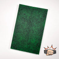 Grip-Tec™ is a revolutionary rubber and resin composite  ideal for hunting knives, filet knives, kitchen knives, and your favorite EDC knife. It comes in many vibrant colours. Shown is a sheet of green and black. 