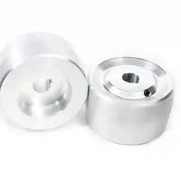 Image is of two silver metal 4" diameter drive wheels with a 3/4" bore. Knife making grinder accessories.