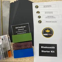 Shows all supplies to make two chef or hunting knives. Including glue, steel, pins, handle materials, instructions, product information.