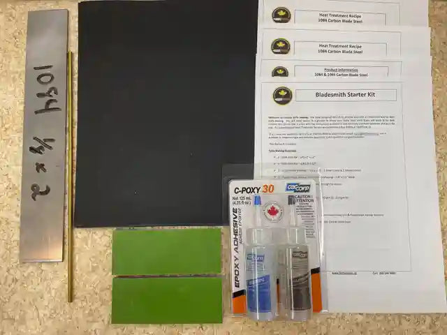 Shows all supplies to make a chef or hunting knife. Including glue, steel, pin, handle material, instructions, product information.