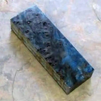 
              Raffir Popular Burl Wood maintains the unique grain patterns of the untreated wood makes beautiful knife handles. Shows a block of blue. 
            